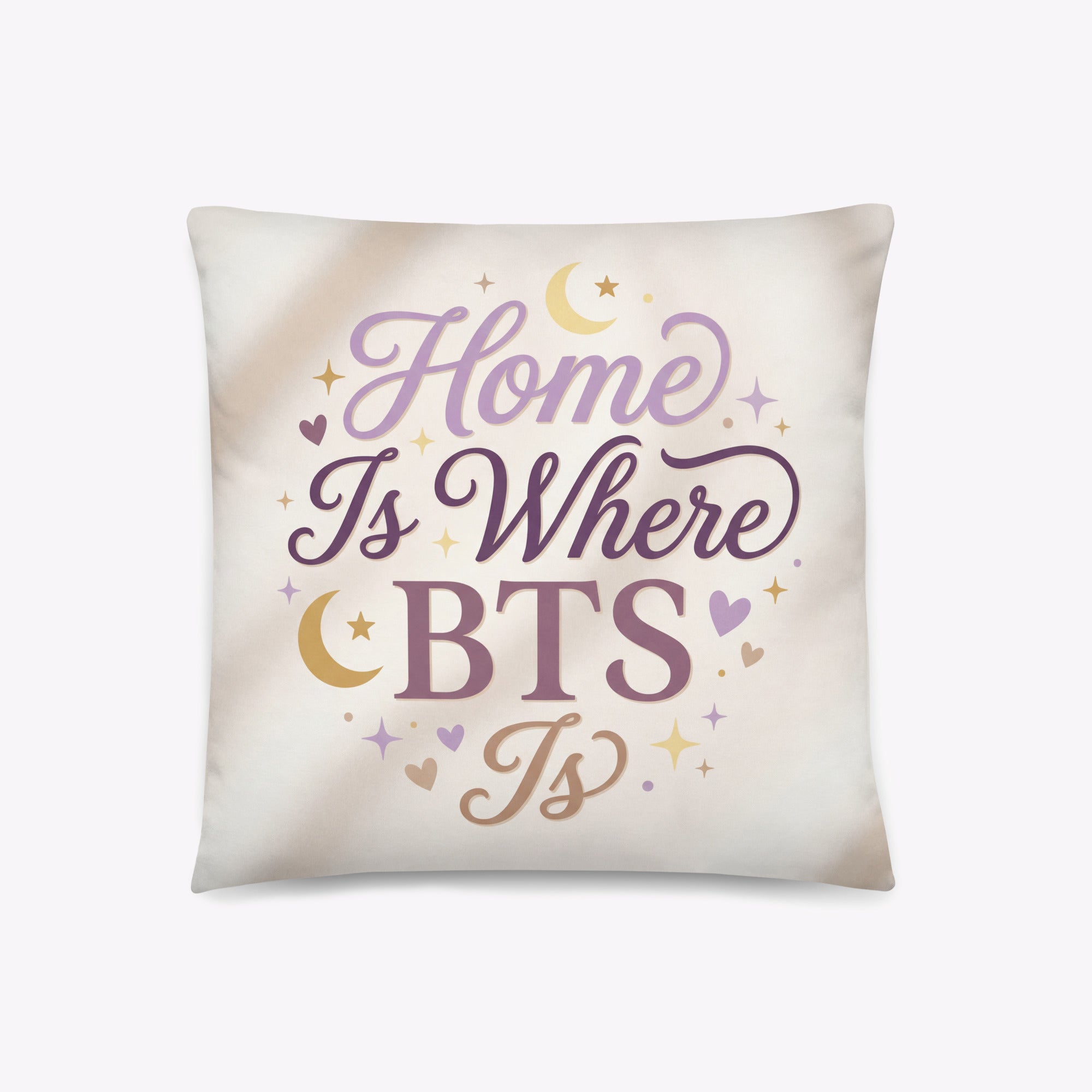Decorative pillow with 'Home is where BTS is' text on a light background